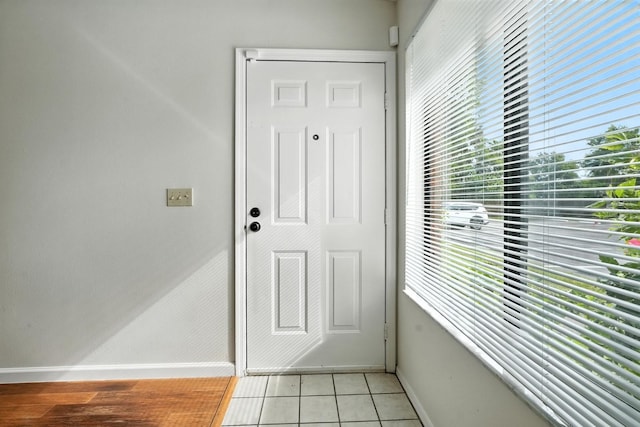 1512 Heritage Ln, Daytona Beach, FL 32117 - foyer entrance with baseboards and light tile patterned floors