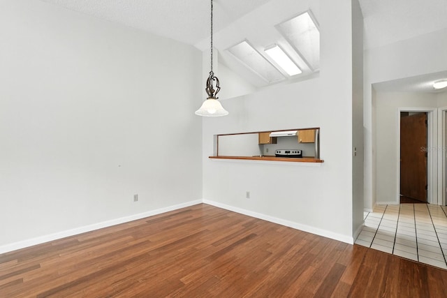 1512 Heritage Ln, Daytona Beach, FL 32117 - unfurnished dining area featuring lofted ceiling and wood finished floors