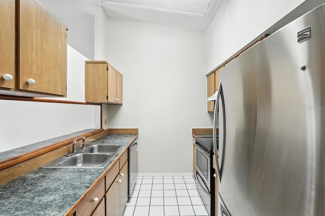 1512 Heritage Ln, Daytona Beach, FL 32117 - kitchen featuring stainless steel appliances, light tile patterned floors, vaulted ceiling, dark countertops, and brown cabinetry
