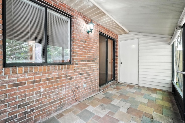 1512 Heritage Ln, Daytona Beach, FL 32117 - unfurnished sunroom featuring vaulted ceiling