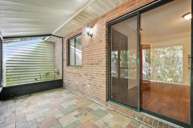 1512 Heritage Ln, Daytona Beach, FL 32117 - unfurnished sunroom featuring lofted ceiling