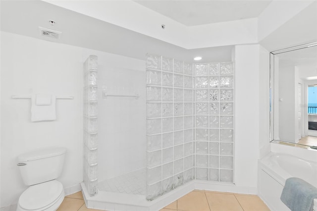 3315 S Atlantic Ave Unit 408, Daytona Beach Shores, FL 32118 - bathroom featuring tile patterned flooring, tiled shower, and a bath