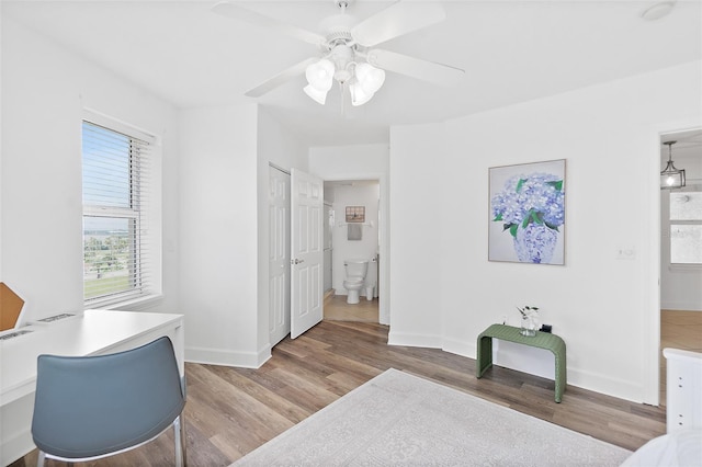 3315 S Atlantic Ave Unit 408, Daytona Beach Shores, FL 32118 - home office featuring wood finished floors and a ceiling fan