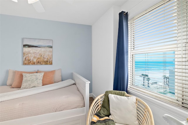 3315 S Atlantic Ave Unit 408, Daytona Beach Shores, FL 32118 - bedroom featuring baseboards and ceiling fan