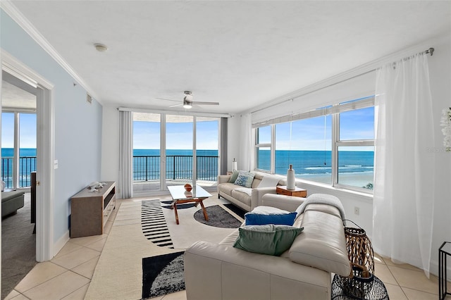 3315 S Atlantic Ave Unit 408, Daytona Beach Shores, FL 32118 - living area with light tile patterned flooring, a water view, a ceiling fan, and ornamental molding