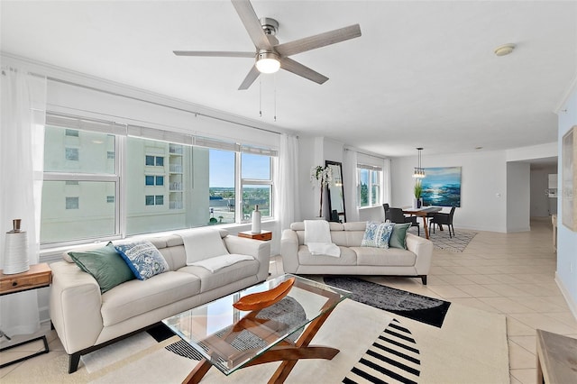 3315 S Atlantic Ave Unit 408, Daytona Beach Shores, FL 32118 - living area featuring light tile patterned floors and a ceiling fan
