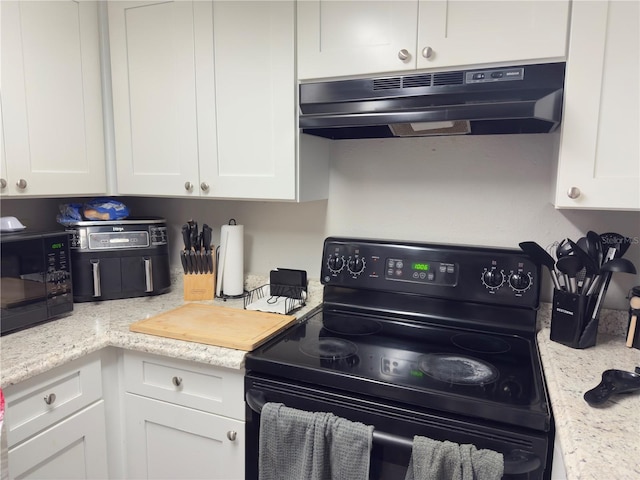 4155 S Semoran Blvd Unit 8, Orlando, FL 32822 - kitchen featuring black appliances, white cabinets, and under cabinet range hood