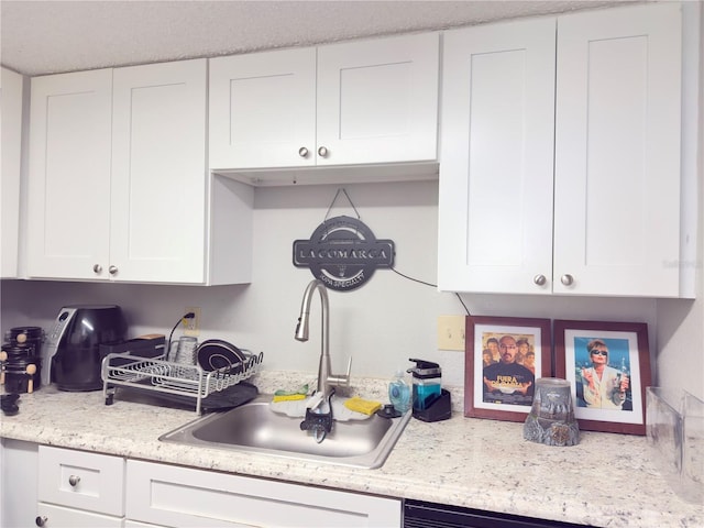 4155 S Semoran Blvd Unit 8, Orlando, FL 32822 - kitchen with white cabinets