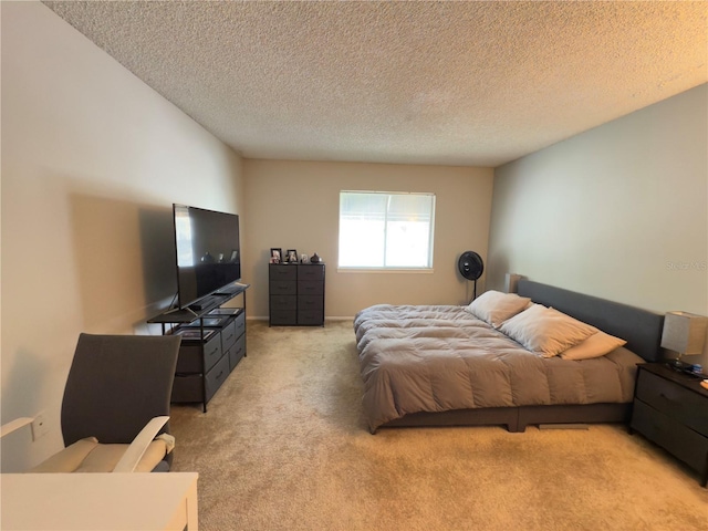 4155 S Semoran Blvd Unit 8, Orlando, FL 32822 - bedroom featuring light colored carpet and a textured ceiling