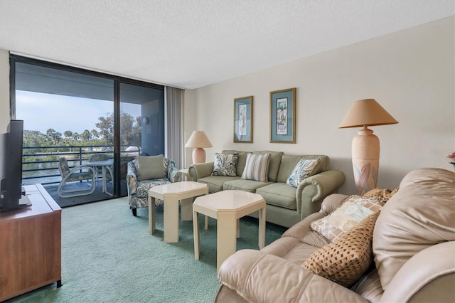 living room featuring a textured ceiling, light colored carpet, and a wall of windows