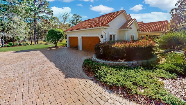 view of home's exterior with a garage