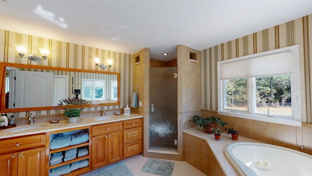 bathroom with plus walk in shower and vanity