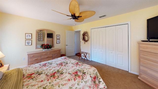 bedroom featuring carpet floors, a closet, and ceiling fan