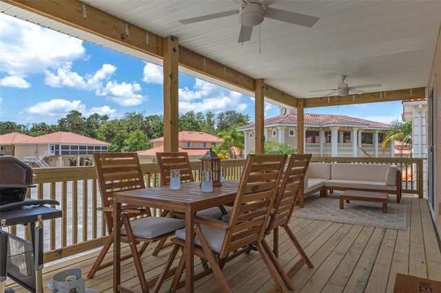 deck featuring ceiling fan and an outdoor hangout area