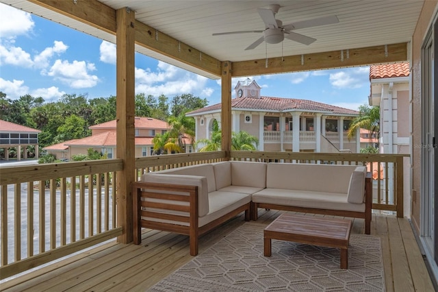 wooden deck with ceiling fan and an outdoor hangout area