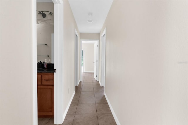 hall featuring tile patterned floors