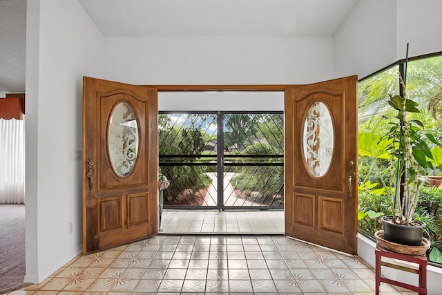 view of tiled foyer entrance