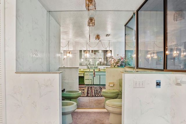 bathroom featuring a bidet and toilet