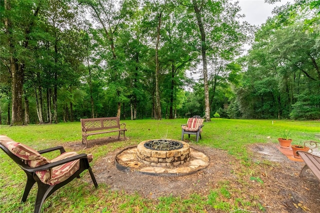 view of yard featuring a fire pit