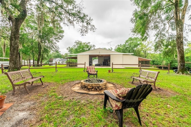 view of yard featuring a fire pit