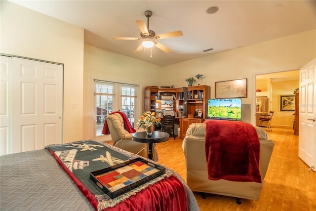 bedroom with ceiling fan and light hardwood / wood-style flooring