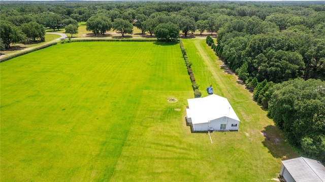 birds eye view of property featuring a rural view