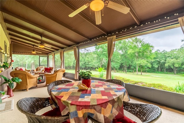 sunroom / solarium with lofted ceiling with beams and plenty of natural light