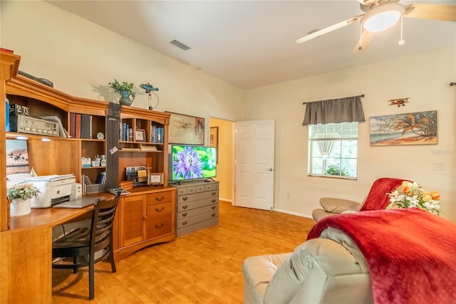 office featuring ceiling fan and light hardwood / wood-style floors