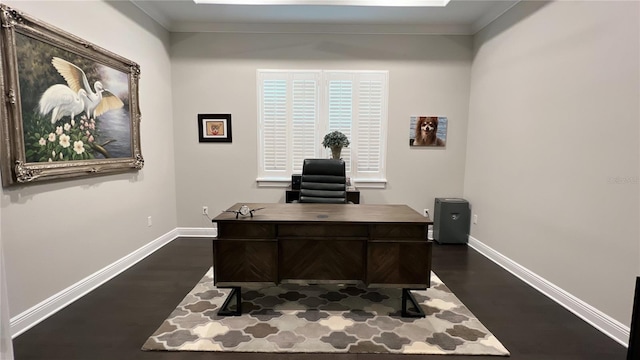 office area with dark hardwood / wood-style floors and crown molding