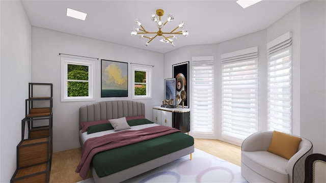 bedroom featuring an inviting chandelier and light wood-type flooring