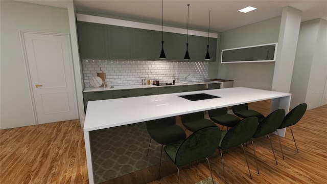 kitchen with backsplash, light wood-type flooring, and pendant lighting