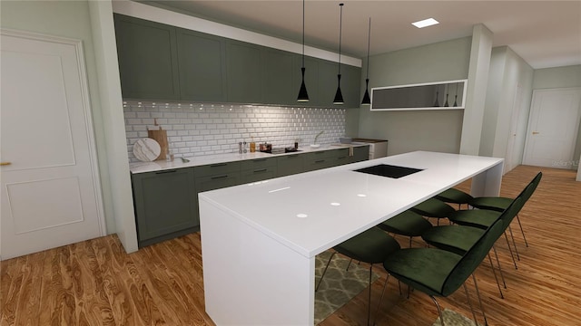 kitchen with light wood-type flooring, a breakfast bar area, tasteful backsplash, decorative light fixtures, and a center island