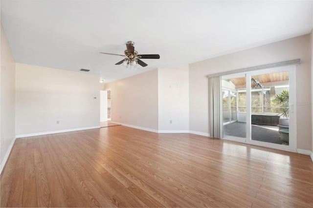 empty room featuring ceiling fan and light hardwood / wood-style flooring