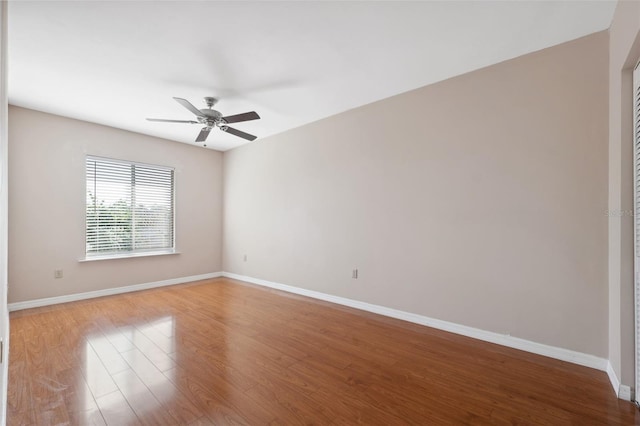 unfurnished room with ceiling fan and light hardwood / wood-style flooring