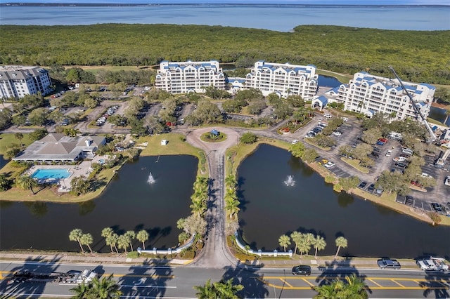 birds eye view of property featuring a water view