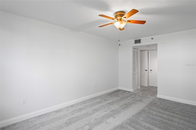 unfurnished room featuring carpet flooring and ceiling fan