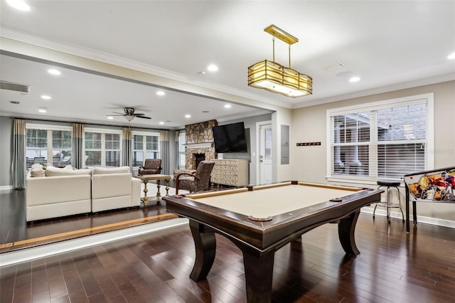 rec room with dark hardwood / wood-style floors, ornamental molding, a fireplace, and billiards