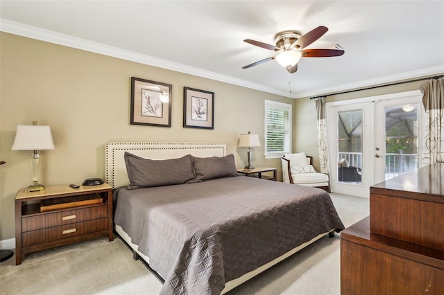 carpeted bedroom with access to outside, ceiling fan, french doors, and ornamental molding