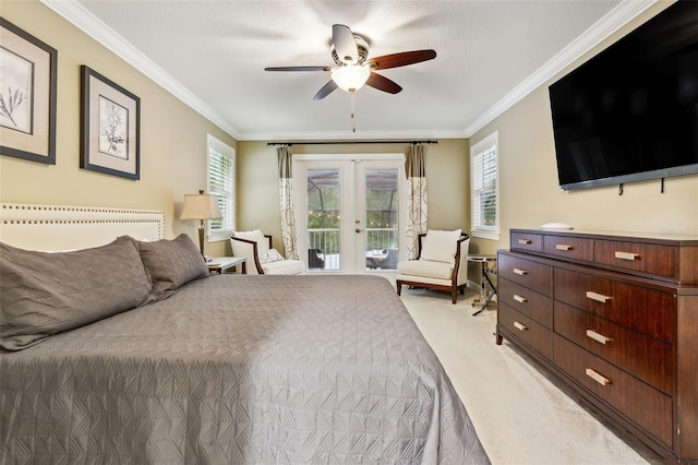 carpeted bedroom featuring access to exterior, french doors, ornamental molding, ceiling fan, and multiple windows