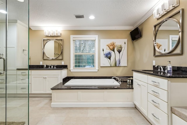 bathroom with vanity, shower with separate bathtub, crown molding, and a textured ceiling