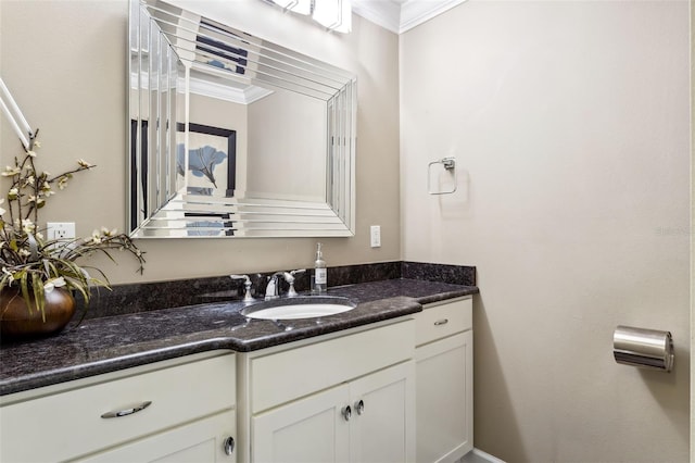 bathroom featuring vanity and crown molding