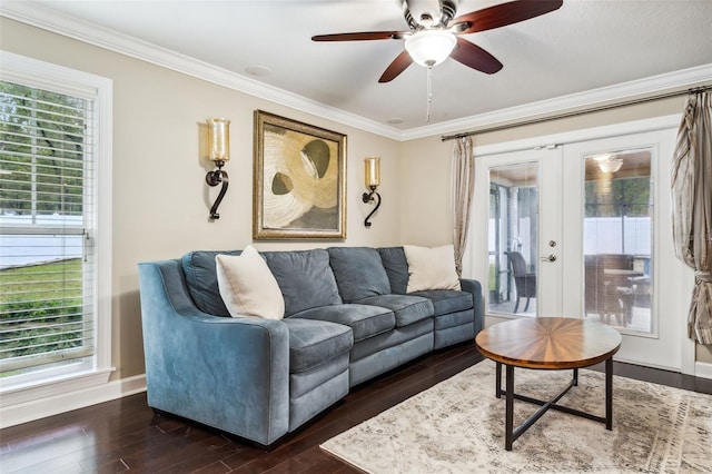 living room with ceiling fan, french doors, dark wood-type flooring, and ornamental molding