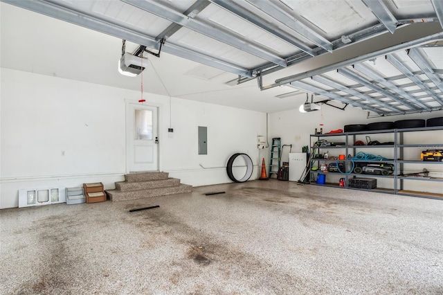 garage featuring electric panel and a garage door opener