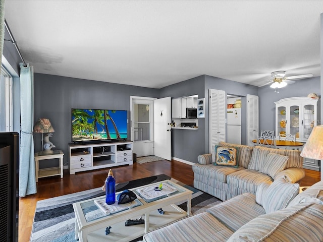 5108 Amulet Dr Unit 206, New Port Richey, FL 34652 - living room featuring dark hardwood / wood-style floors, ceiling fan, and a wealth of natural light