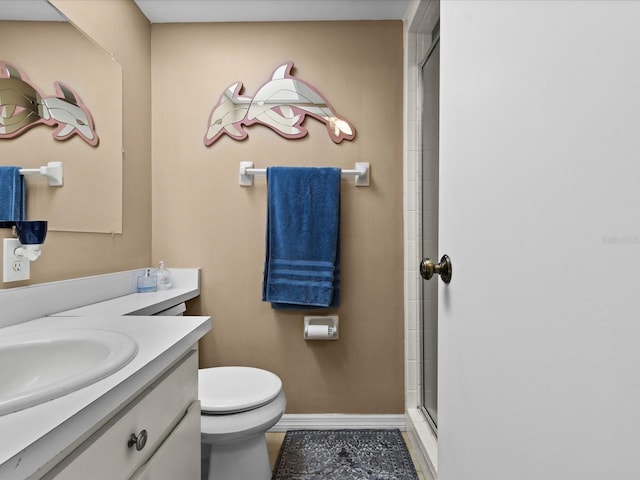 5108 Amulet Dr Unit 206, New Port Richey, FL 34652 - bathroom with tile patterned flooring, vanity, an enclosed shower, and toilet