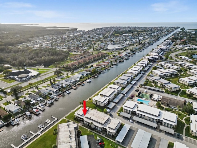5108 Amulet Dr Unit 206, New Port Richey, FL 34652 - drone / aerial view featuring a water view