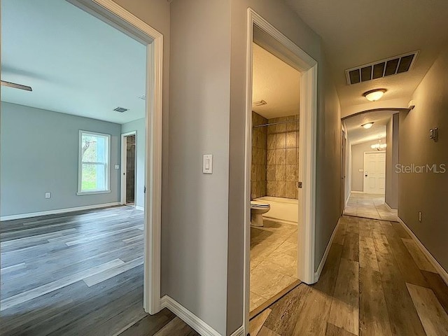 hall featuring hardwood / wood-style floors