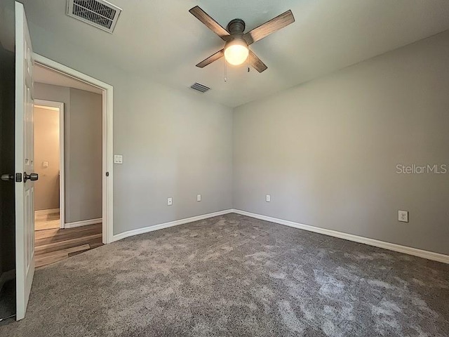 unfurnished room with carpet floors and ceiling fan