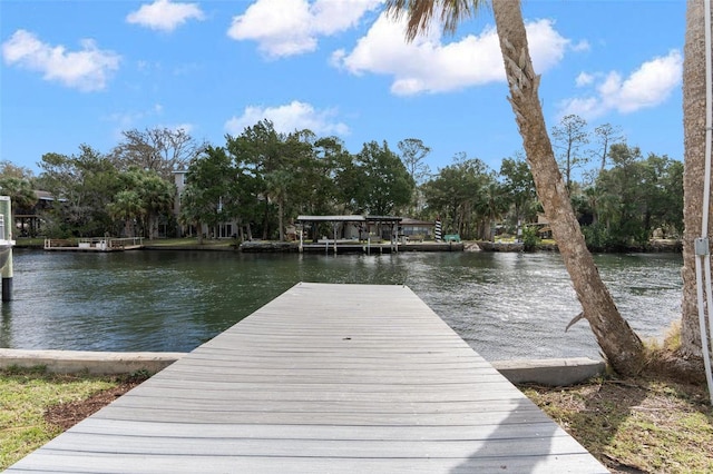 view of dock with a water view