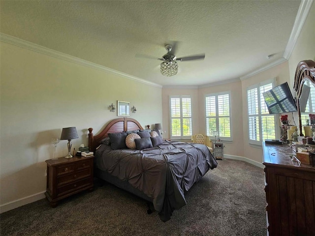 carpeted bedroom with a textured ceiling, ceiling fan, and crown molding